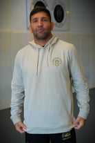 Man in smoke hoodie with JJJ logo on left chest