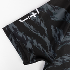 JJJ on sleeve of ladies rashguard