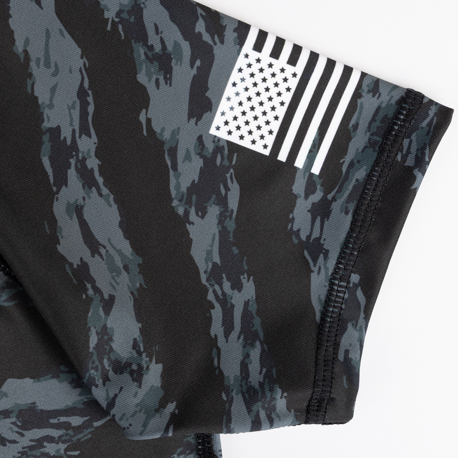 Flag on sleeve of Ladies camo rashguard