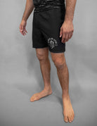 Black shorts with Jesus & Jiu Jitsu logo with "PRAY HARD TRAIN HARD" text 